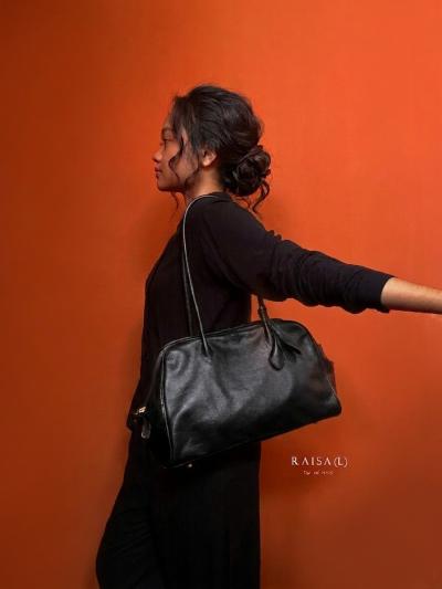 Raisa L Hitam